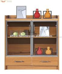 The sliding design helps it stay neatly out of the way of those brewing a pot or pouring a cup of coffee. Buy Office Coffee Cabinets Coffee Bar Cabinet Product On Alibaba Com