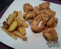 L'unione calamari e patate è però quella che caratterizza questa ricetta: Anelli Di Calamari Impanati E Cotti Al Forno