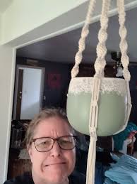 Can you add a ring to hang a plant hanger higher?