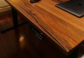 The hugo desk in walnut and black is built from durable materials and features a black melamine over mdf top on a walnut laminate frame and drawer front. Timber A Frame Sit Stand Desk Timber Frame Desk Zen Space Desks