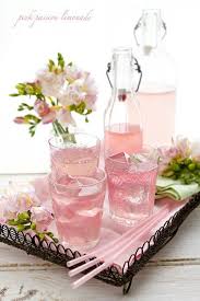 Pretty Bottles Of Pink Lemonade Freeze Pink Lemonade In Ice Cube Trays Ahead Of Time So The Ice Cubes Don T Dilute The Beverages Pink Foods Pink Drinks Pink Lemonade