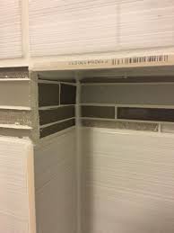 How to end edges of backsplash. Shower Niche Tile Unfinished Edge Home Improvement Stack Exchange