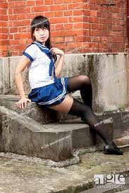 Asian schoolgirl in uniform outside school, Stock Photo, Picture And Low  Budget Royalty Free Image. Pic. ESY-015720493 | agefotostock