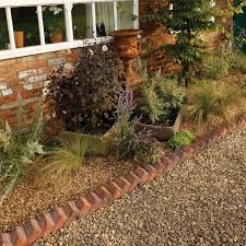 This particular type of edging has the advantage of being very flexible. Pin By Andrea Shaw On Barnsley Garden Landscaping Retaining Walls Paving Edging Garden Paving