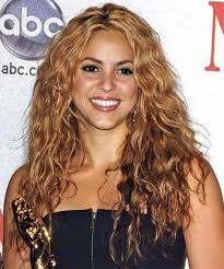 That's great, but can we be shallow for a minute and talk about her hair? How To Get Shakira Curly Hair