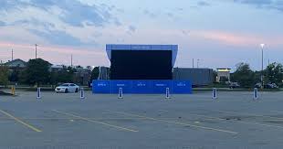 Movie theaters are under pressure to reopen after having virtually zero revenue for four months. Walmart In Olathe Hosts Drive In Theater As Movie Theaters Start To Open