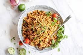 Pulse cauliflower in a food processor until it's riced (ie, the size of couscous). Whole30 Mexican Rice Recipe Paleo Sunkissed Kitchen