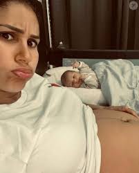 Photo : Wafa avec son fils Aaron, mai 2021