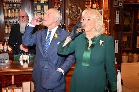 King Charles and Queen Camilla knock ...