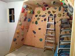 Keep Your Kids Active All Year With A Home Rock Climbing Wall The Recreationalist Rock Climbing Wall Diy Climbing Wall Home Climbing Wall