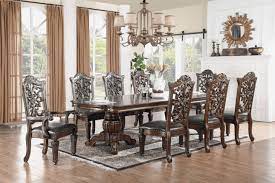 The wood used in the formal dining sets is crucial in establishing the theme of the room. Traditional Ornately Carved Dark Wood Formal Dining Room Furniture Set