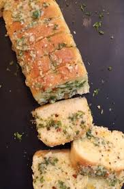 Freshly Baked Bread Stuffed With Garlic Directly Roast With Olive Oil Mashed Then Mixed With Butter Parsley Italian Food Bread Baking Garlic Bread