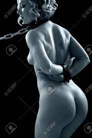 Nude Young Woman In Bdsm Accessories On Black Background Stock Photo,  Picture and Royalty Free Image. Image 4354836.