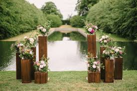 Vase of flowers wedding ceremony in park. 25 Epic Wedding Ceremony Styling Ideas One Fab Day