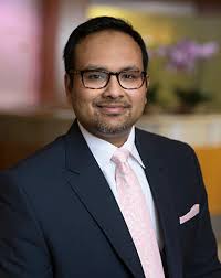 Sam E. Khan, Partner