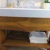 You can put a bar of bubble lights above the sink, mount decorative sconces on either side of the vanity, or use bathroom flushmounts to illuminate the space from overhead. 1