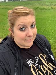 Reminding my daughter of her parade walk in the rain