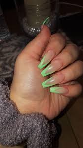 Another cute long acrylic nails can be achieved by painting your square coffin nails with a bright orange color. Green And Clear Long Coffin Acrylic Nails Green Acrylic Nails Pretty Acrylic Nails Almond Acrylic Nails
