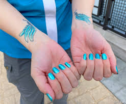 For the disney and tattoo lovers! Photos New Tattoo And Gender Inclusive Hairstyle Dress Code Now In Effect At Disney World Allears Net