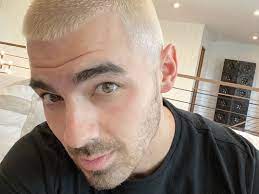 Bleached hair looks blonde, if bleached enough. Joe Jonas Dyed His Hair Blonde Gq