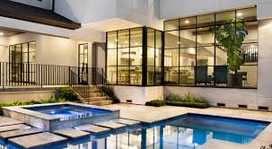 The swimming pool also provides changing rooms and other amenities. Modern Bellaire Farmhouse Modern Swimming Pool Houston By Rehme Steel Windows Doors Houzz