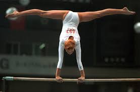 The uneven bars apparatus originally were just a set of men's parallel bars, with the bars set to different heights. Svetlana Khorkina Earns Gold On The Uneven Bars After A Disappointing All Around Finish 10 Moments In Olympic Women S Gymnastics That Stunned The World Popsugar Fitness Photo 6