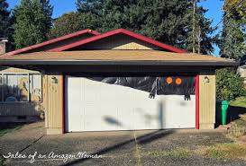 Garbage Bags Construction Paper And Some Creativity Made This Garage Door Decoration Easy Halloween Decorations Halloween Home Decor Door Decorations