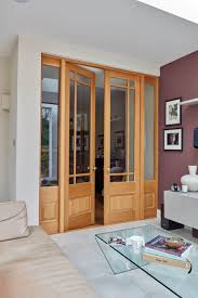 The large glass panels in these internal double doors allow natural light to flow between rooms whilst dividing your space into clear zones. Internal Glass Double Doors London Door Company