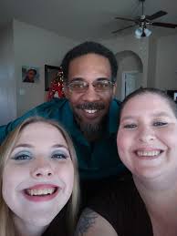 Photo editing request to remove person and adjust family photo