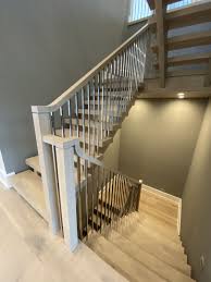 Staircase spindles are available in a range of materials including woods such as oak, ash, hemlock (and primed white) but also very popular are glass or acrylic panels, chrome or bushed nickel (tubular poles) and iron spindles. Hl Stairs Project 1918 Hinsdale Il Hl Stairs Custom Handcrafted Staircases Serving The Greater Chicago Area