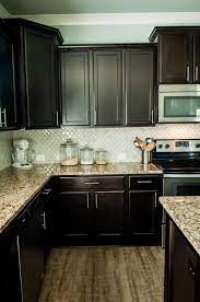 Arabesque Selene Tile Backsplash With Espresso Cabinets And Granite Backsplash With Dark Cabinets Espresso Kitchen Cabinets Kitchen Remodel