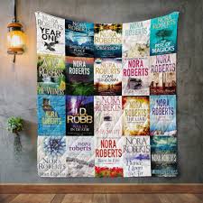 Nora Roberts Books Quilt Blanket Doveprints Nora roberts (born eleanor marie robertson on october 10, 1950 in silver spring, maryland) is the bestselling american author of over 209 romance many of roberts' books are written in trilogies and she has also published a science fiction series entitled in death under the pseudonym j.d. nora roberts books quilt blanket