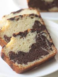 Eggless Chocolate Marble Cake The Indian Claypot Recipe Chocolate Marble Cake Eggless Marble Cake Recipe Vegan Cake Recipes