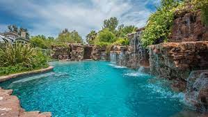 binnenkijken in de afgelegen villa van angelina jolie pool waterfall amazing swimming pools pool landscaping