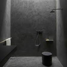 Closeup shot of a wooden floor with dark brown vertical tiles. 32 Dark Moody Bathroom Designs That Impress Digsdigs
