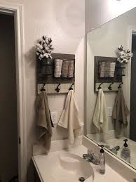 Farmhouse bathroom ideas & designs. Farmhouse Bathroom Wall Organizer And Towel Holder Cottage Bathroom Design Ideas Bathroom Decor Small Bathroom Decor