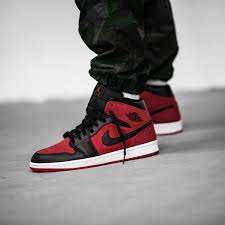 Black White Jordan 1 Mid The Air Jordan 1 Mid In Gym Red Black White Is Now Available On Kickz Com Stay Classic Sneakers Air Jordans Nike Air Jordan Shoes Air Jordans Retro