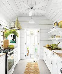 6 Small Galley Kitchen Ideas That Are Straight Up Great Beach House Kitchens Beach House Interior White Beach Houses