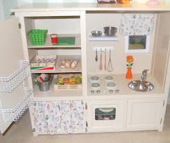 Convert old tv cabinets into state of the art play kitchens by mod home ec teacher on jan 10, 2011 you've seen these clunky monsters at goodwill, garage sales, or possibly in your own basement. Deciding On A Curtain Under Sink Diy Kids Kitchen Repurposed Furniture Diy Play Kitchen
