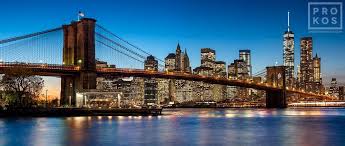 Panoramic Skyline Of The Brooklyn Bridge And Manhattan At Twilight Framed Photograph By Andrew Prokos