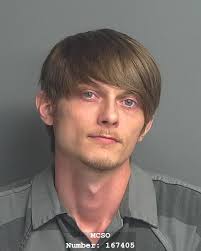 HOLMES JAMES HENRY was booked into the Montgomery County Jail