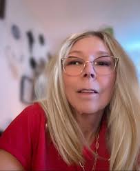 Hi all! I just wanted to introduce myself and share a photo I took. I love  all breeds of cats. I had a white kahoo mane she was not blind though.  Currently