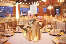 Many people use wine bottles for making centerpieces, because they are cheap, creative and beautiful. Wine Bottle Centerpieces Wine Bottle Centerpieces Wedding Centerpieces Bottle Centerpieces