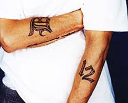 And 16 of them are portraits of the rapper, which earned her the world record. Eminem Eminem S Tattoos