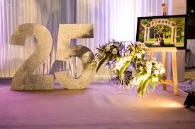 Make your 25th wedding anniversary one to remember by hosting a timeless anniversary party to celebrate this major milestone in your life. Anniversary Decoration Ideas Silver Jubilee Decor Ideas 25th Wedding Anniversary Decorations Wedding Anniversary Decorations 25th Anniversary Decorations
