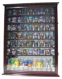 You can choose between a model with a door installed on a piano hinge (series 640/650/660) or a model with a sliding door (series 670). Large 72 Shot Glass Display Case Cabinet Rack Holder Glass Door Mirror Back Cherry Finish Walmart Com Walmart Com