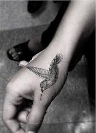 It's unisex and often small in shape, either in black and white or with bold impactful colors. 20 Stunning Hummingbird Tattoo Ideas