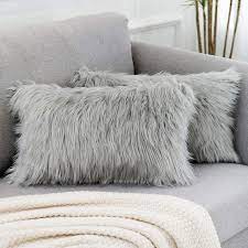 A coordinating solid back features a zippered closure for ease of fill and cleaning. Amazon Com Wlnui Set Of 2 Decorative Lumbar Light Gray Fluffy Pillow Covers New Luxury Series Merino Style Faux Fur Throw Pillow Covers Fuzzy Cushion Case 12x20 Inch Home Kitchen