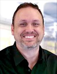 Christopher J. 'Chris' Holland