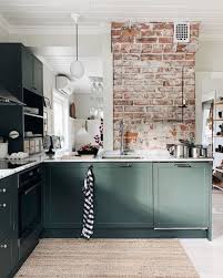 Green Kitchen With Exposed Brick Walls In 2020 Green Kitchen Walls Dark Green Kitchen Green Kitchen Cabinets